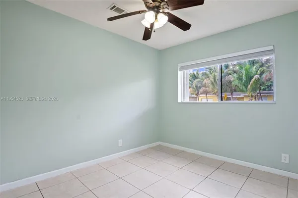 a view of an empty room and window
