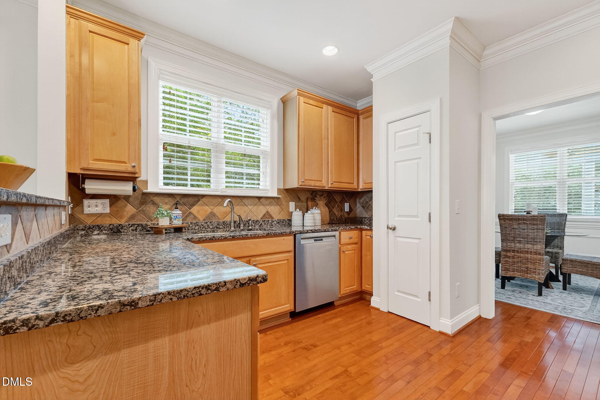 4720 All Points View Way Raleigh, NC 27614 - Photo 13 of 39 a view of a kitchen with kitchen island granite countertop a refrigerator and a sink