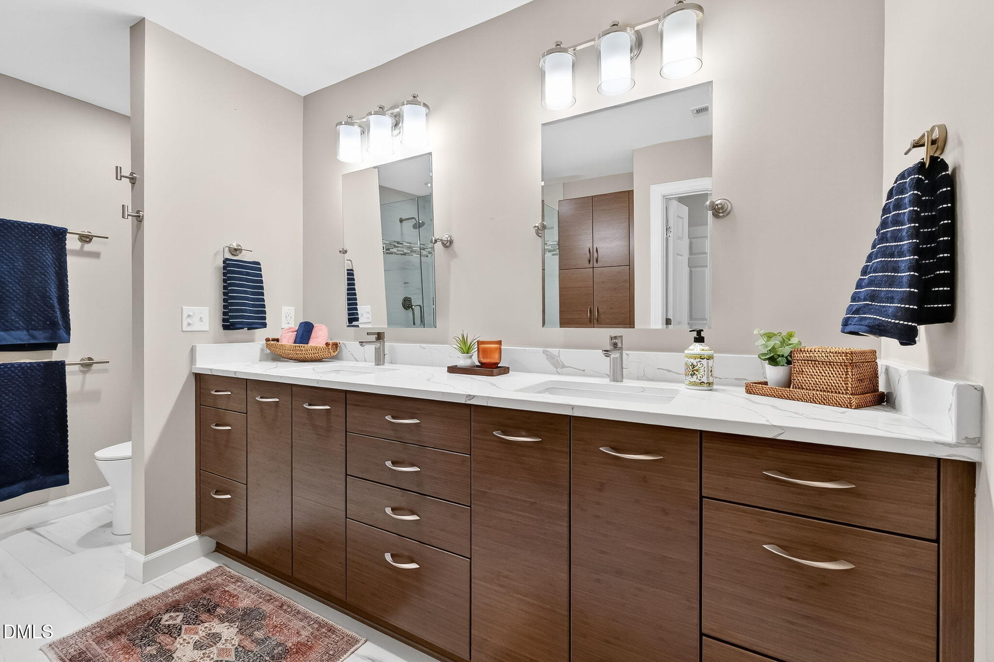 4720 All Points View Way Raleigh, NC 27614 - Photo 34 of 39 a bathroom with double vanity and a mirror