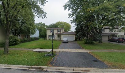 a view of a house with a back yard