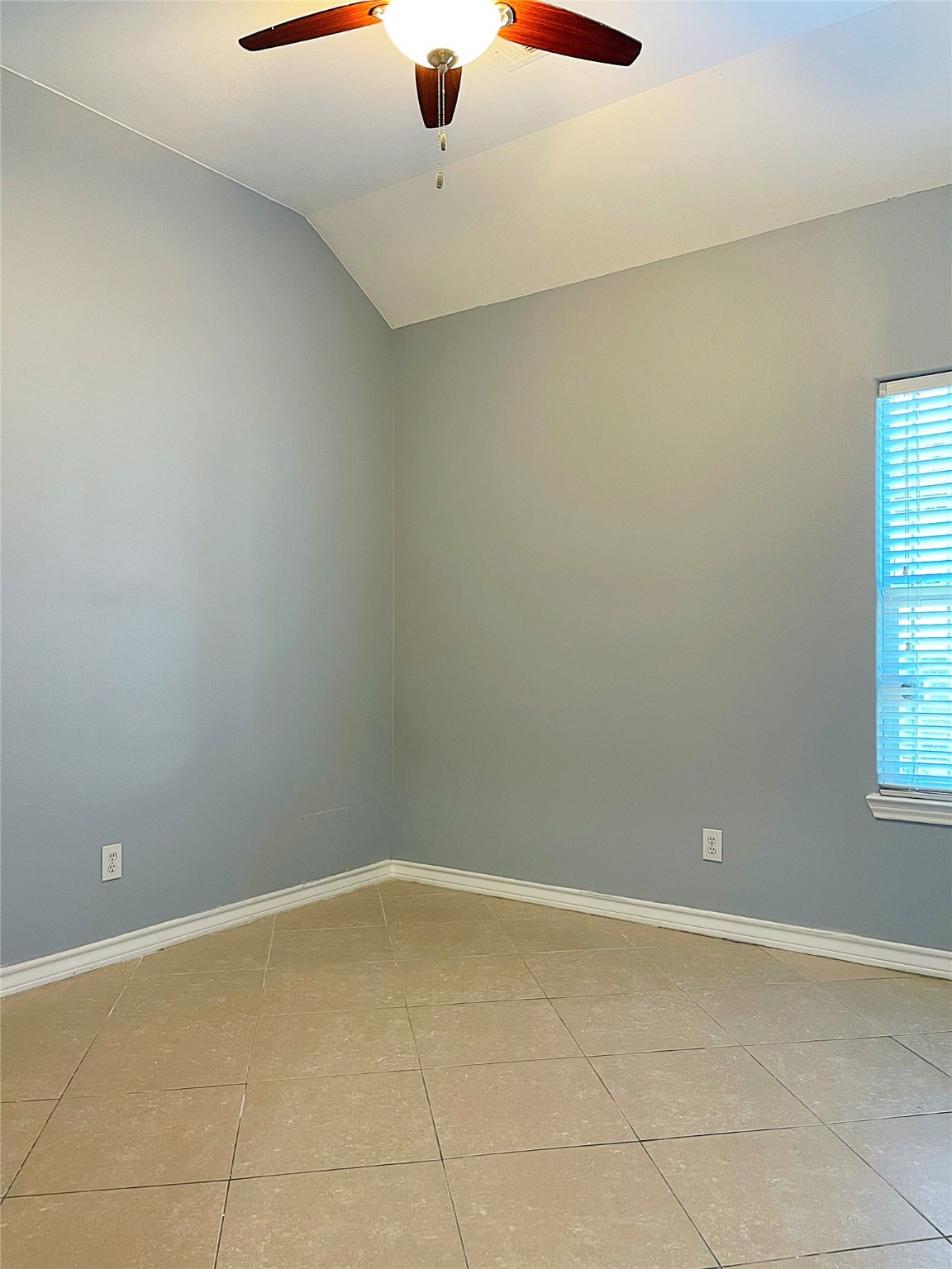 13739 Canyon Hollow Loop Houston, TX 77083 - Photo 7 of 14 a view of an empty room with a window