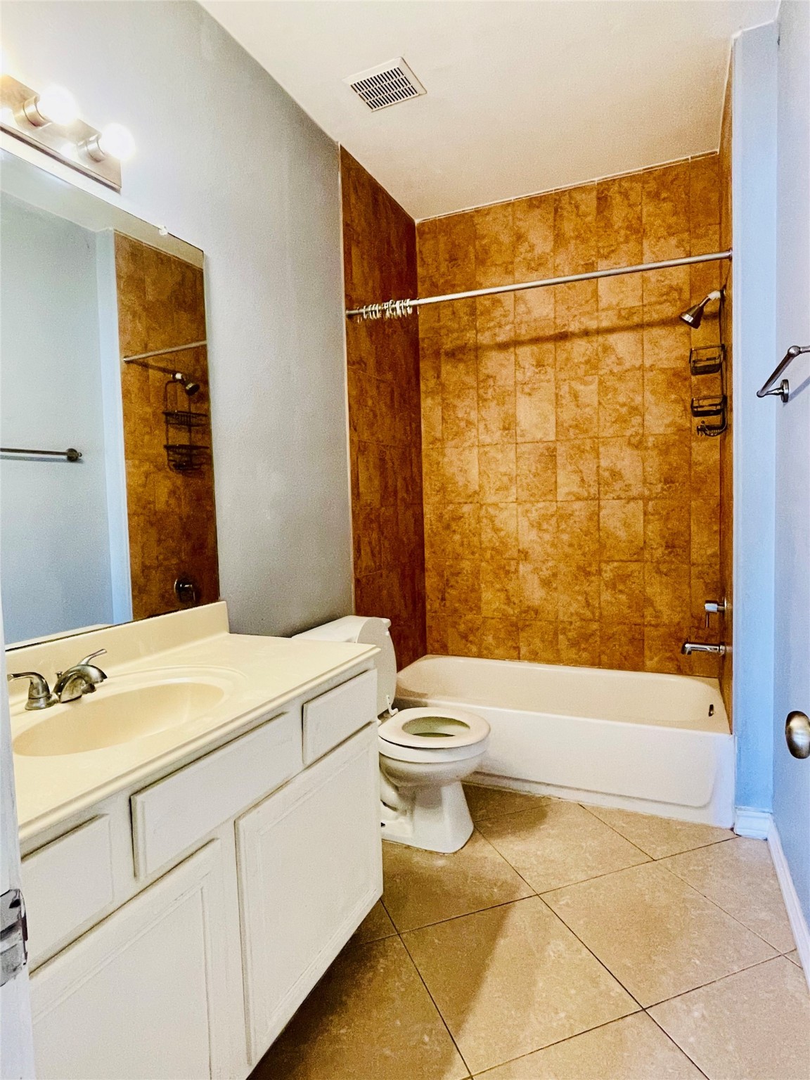 13739 Canyon Hollow Loop Houston, TX 77083 - Photo 8 of 14 a bathroom with a sink toilet and shower
