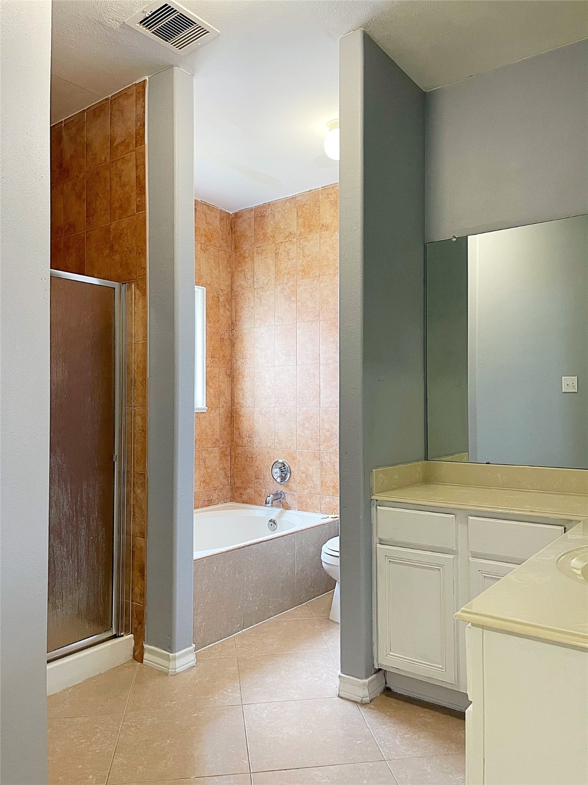 13739 Canyon Hollow Loop Houston, TX 77083 - Photo 10 of 14 a bathroom with a bathtub and a sink