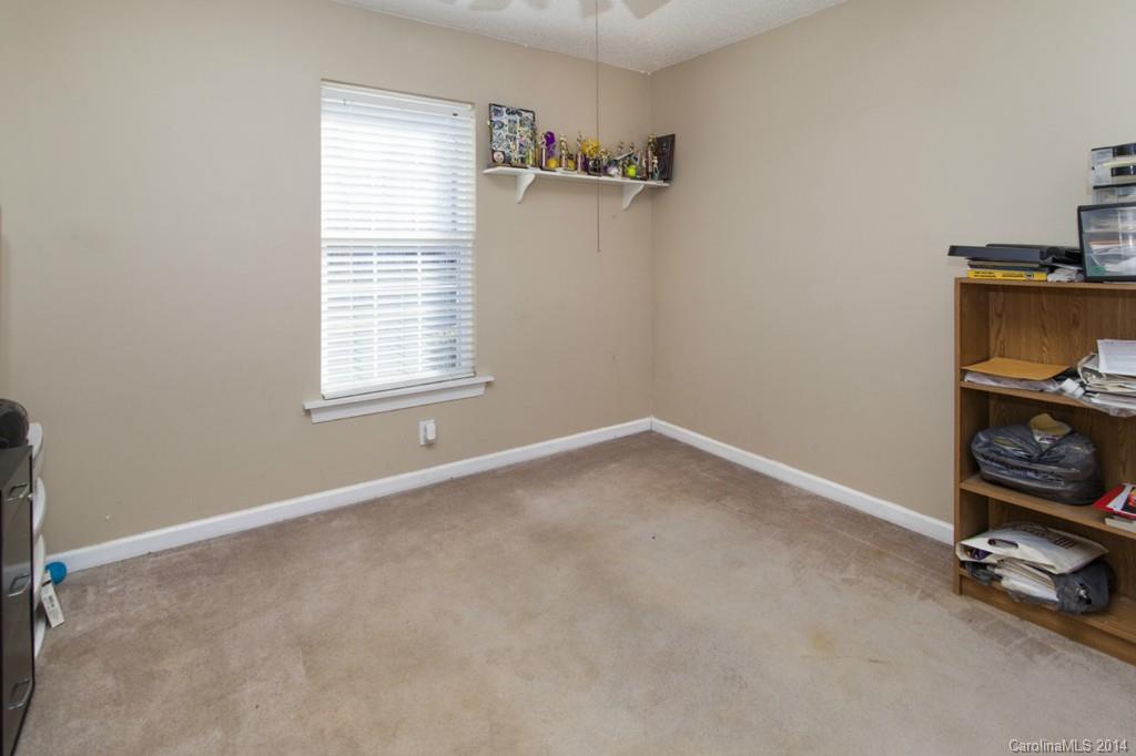 146 State Park Road Troutman, NC 28166 - Photo 13 of 18 an empty room with windows