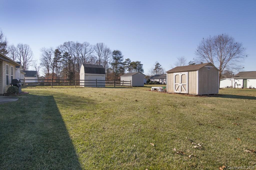 146 State Park Road Troutman, NC 28166 - Photo 15 of 18 a view of a house with a yard
