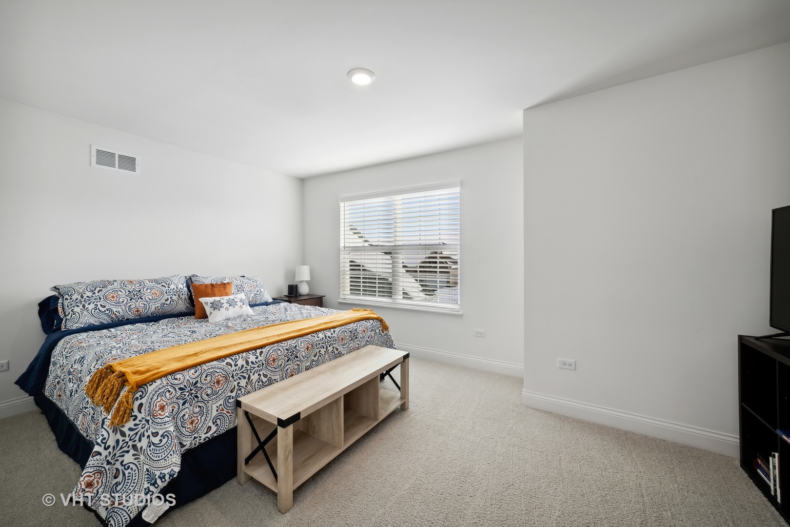 3622 Eldorado Road Elgin, IL 60124 - Photo 17 of 20 a bed sitting in a bedroom next to a window