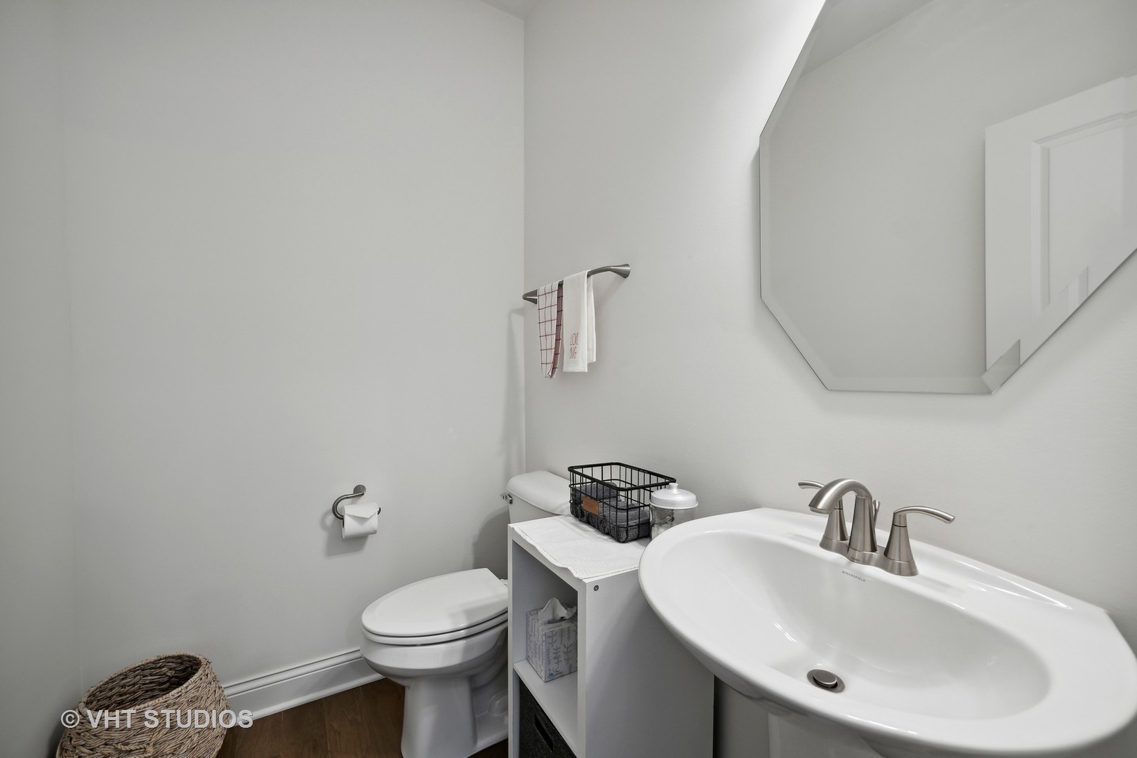 3622 Eldorado Road Elgin, IL 60124 - Photo 19 of 20 a bathroom with a sink a toilet and mirror