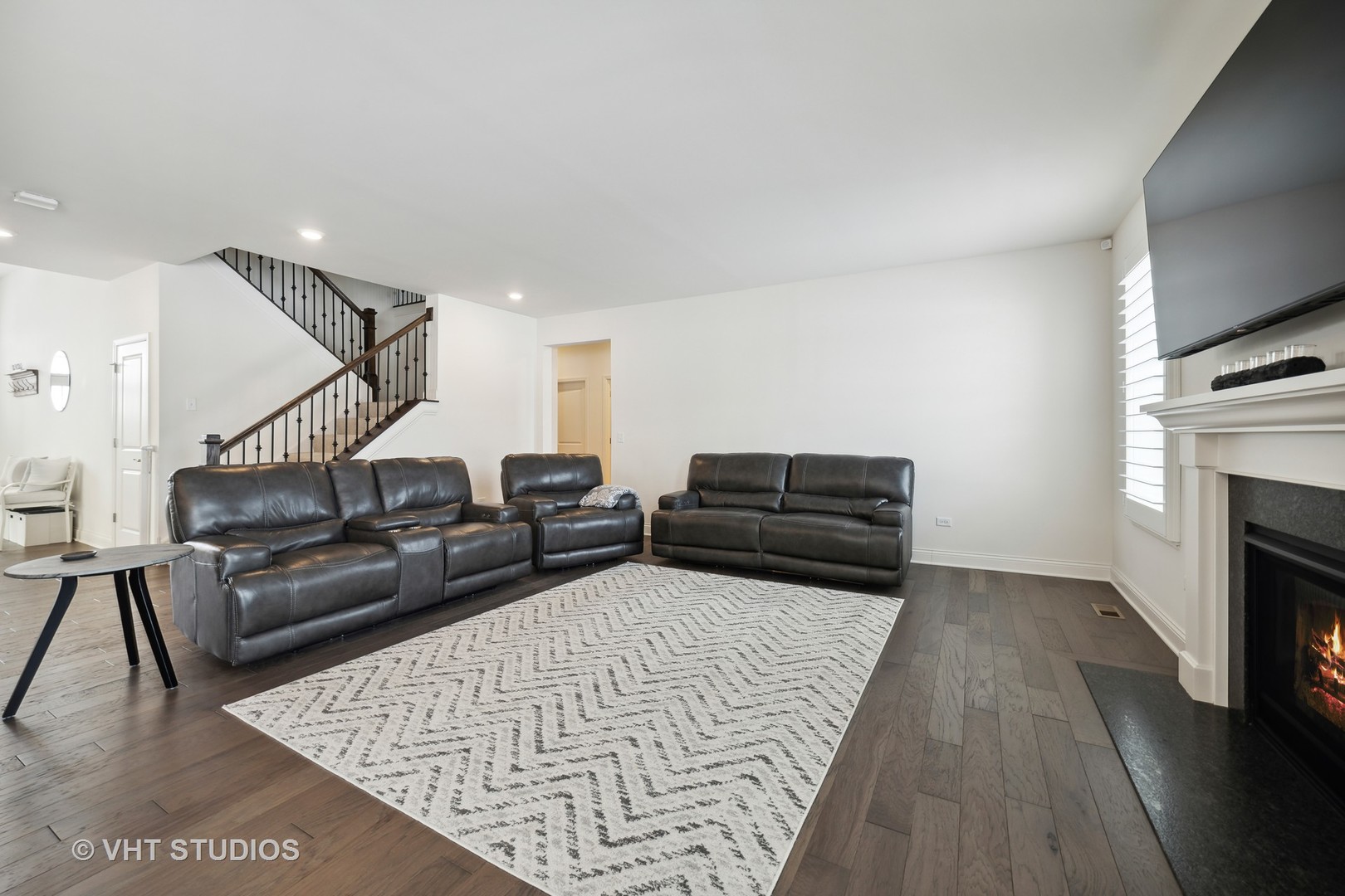 3622 Eldorado Road Elgin, IL 60124 - Photo 10 of 20 a living room with furniture and a fireplace
