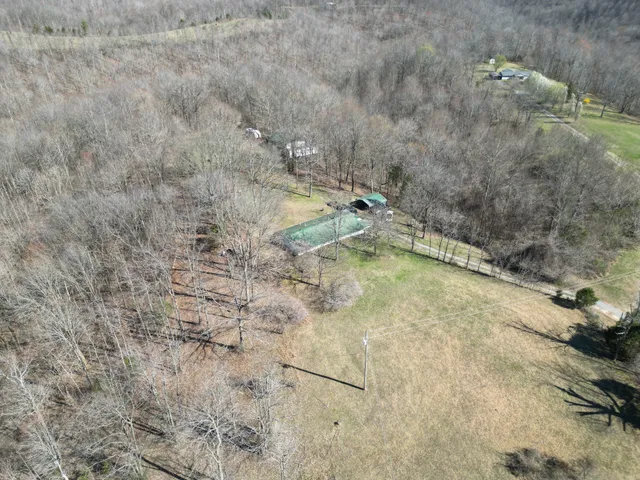a view of a backyard of the house