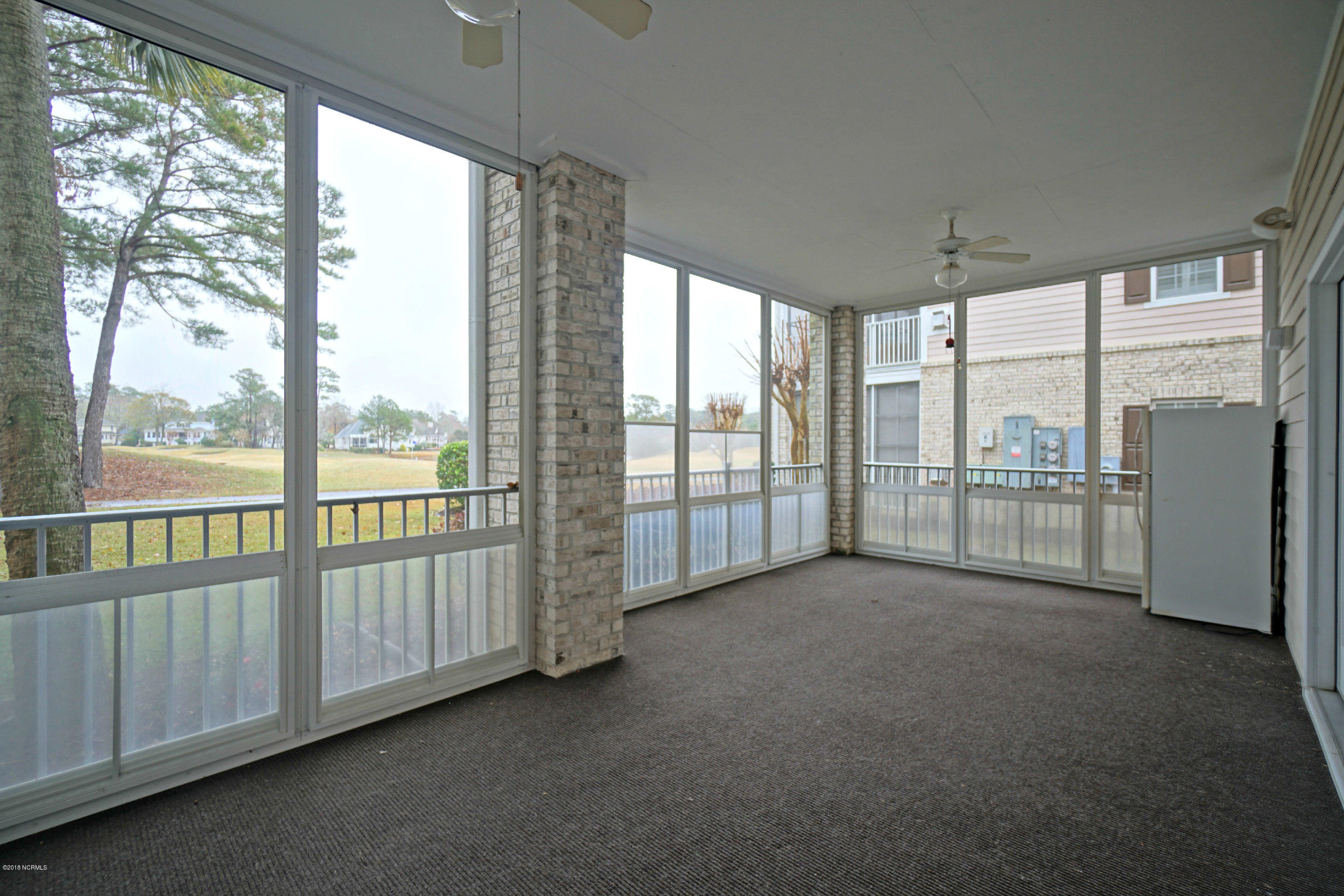 172 Clubhouse Road, Unit 2 Sunset Beach, NC 28468 - Photo 24 of 28 Screened Porch