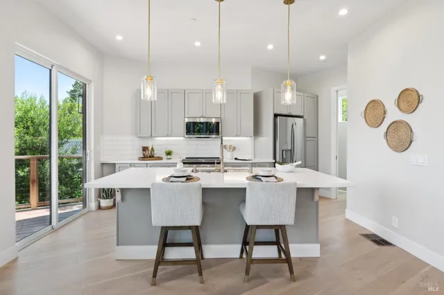 a kitchen with a stove and cabinets