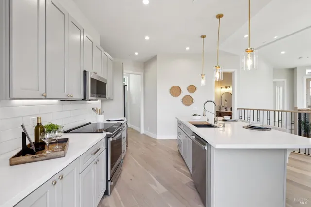 a view of a house with wooden floor and a potted plant