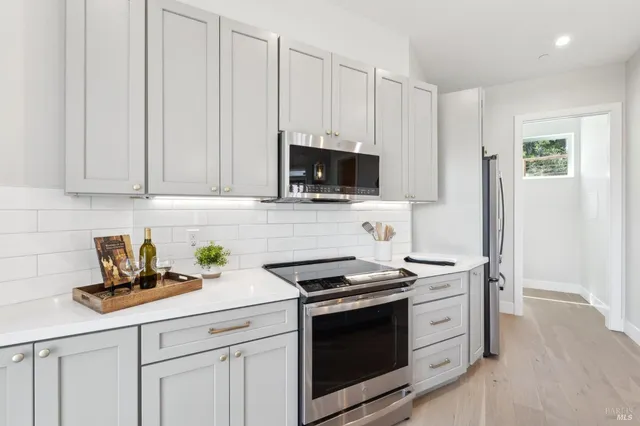 a view of a large building with a mountain in the background