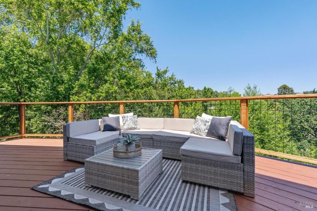 a bedroom with a bed and a potted plant