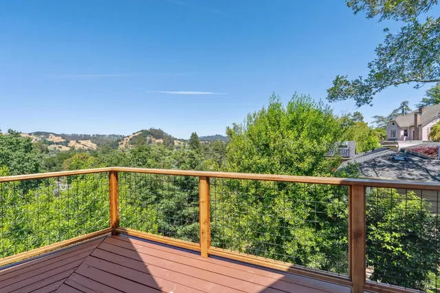 a bed room with a bed and a potted plant
