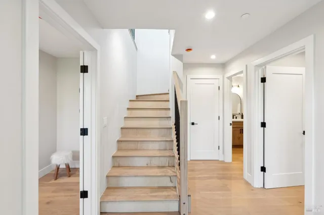 a spacious bathroom with a shower and a sink