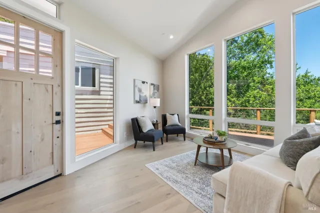 a kitchen with appliances cabinets and furniture
