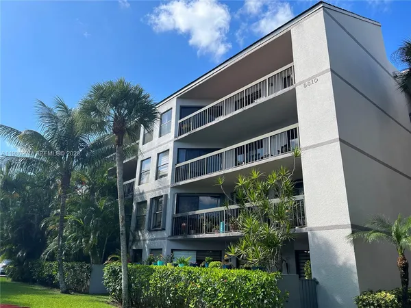 a view of a road with a big yard