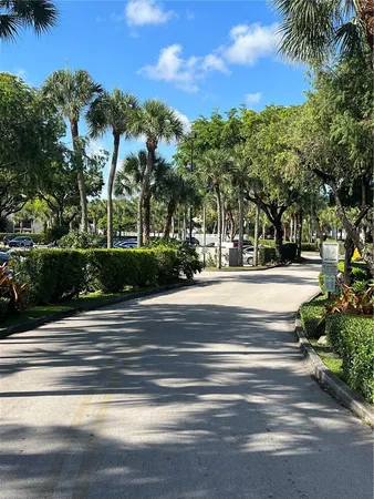 a bathroom with a toilet a sink and shower
