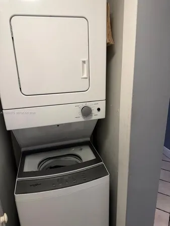 a view of a bathroom with mirror