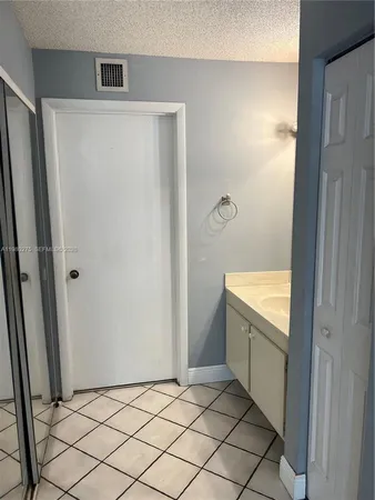 a view of a house with a patio