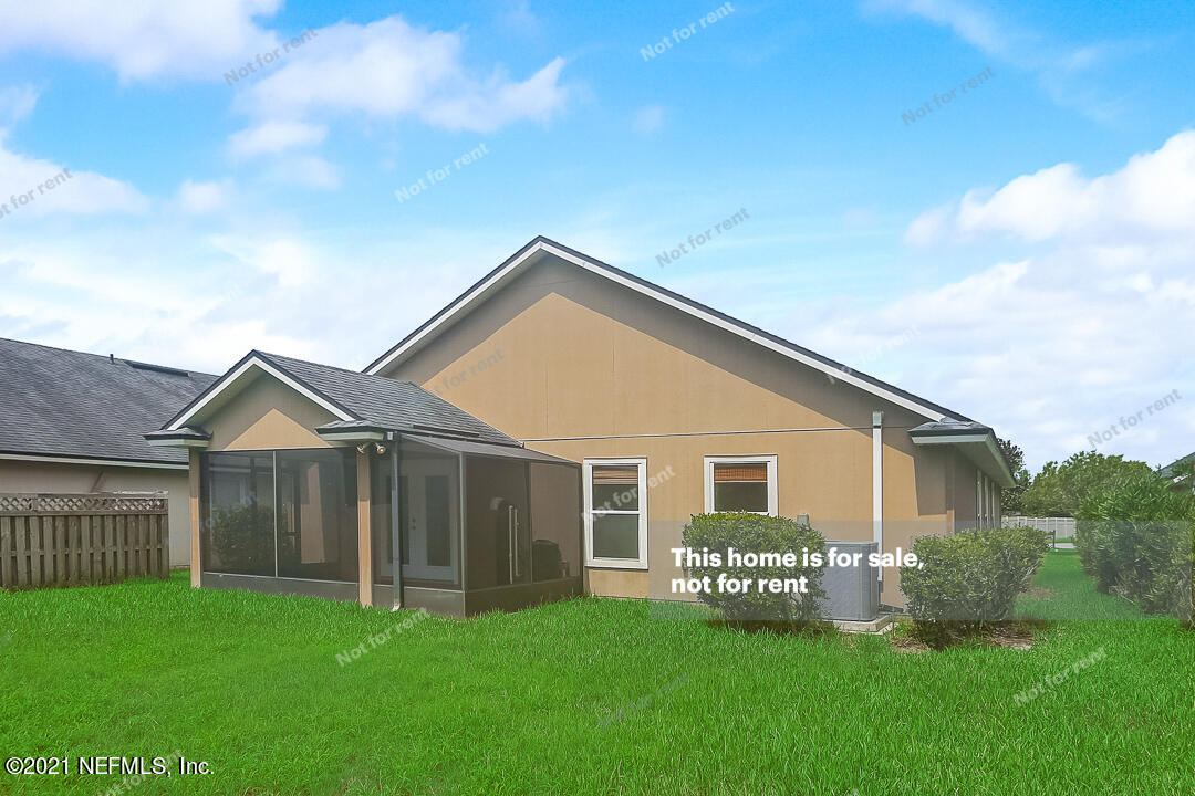 608 Birchbark Trail St. Augustine, FL 32092 - Photo 13 of 35 a front view of a house with a garden