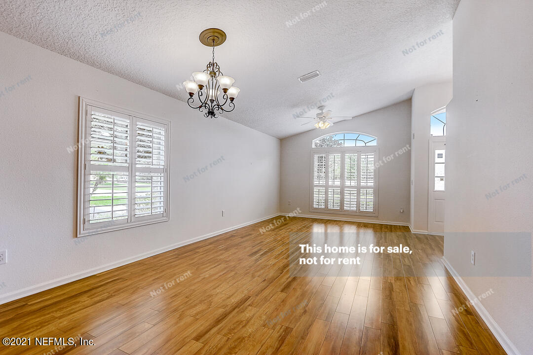 608 Birchbark Trail St. Augustine, FL 32092 - Photo 15 of 35 a view of a livingroom with wooden floor
