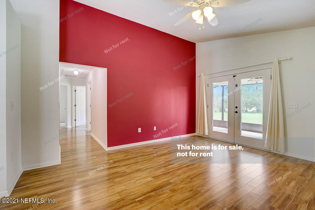 608 Birchbark Trail St. Augustine, FL 32092 - Photo 25 of 35 a view of a livingroom with wooden floor