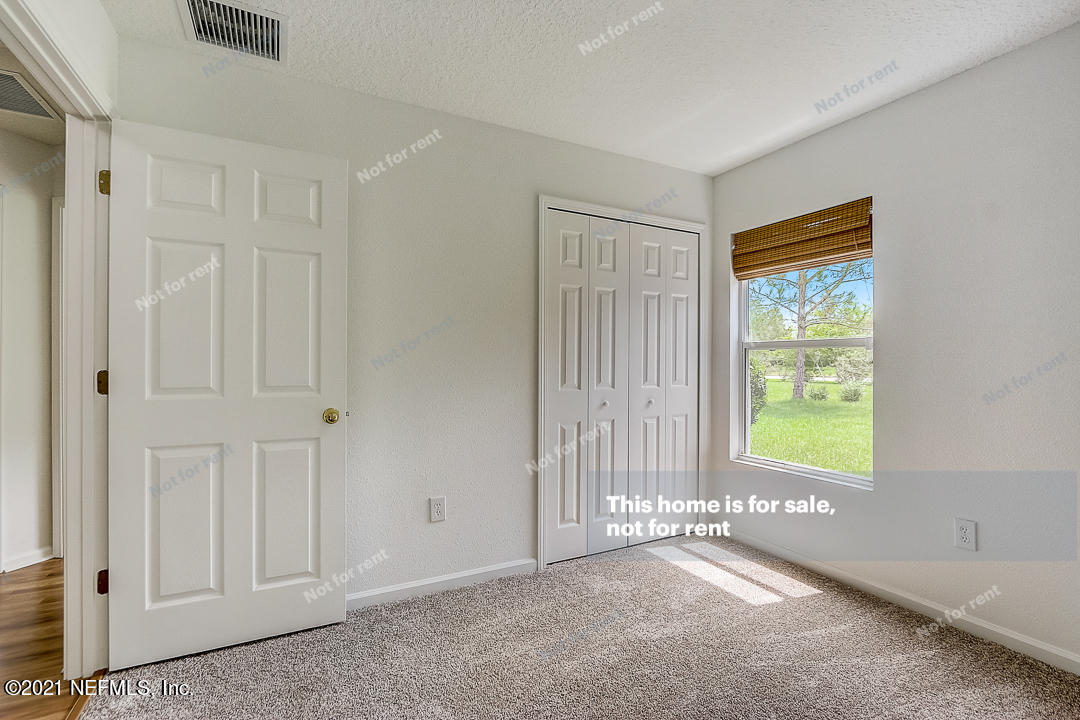 608 Birchbark Trail St. Augustine, FL 32092 - Photo 29 of 35 a view of an empty room with a window