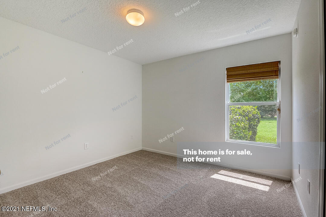 608 Birchbark Trail St. Augustine, FL 32092 - Photo 30 of 35 a view of a window in an empty room