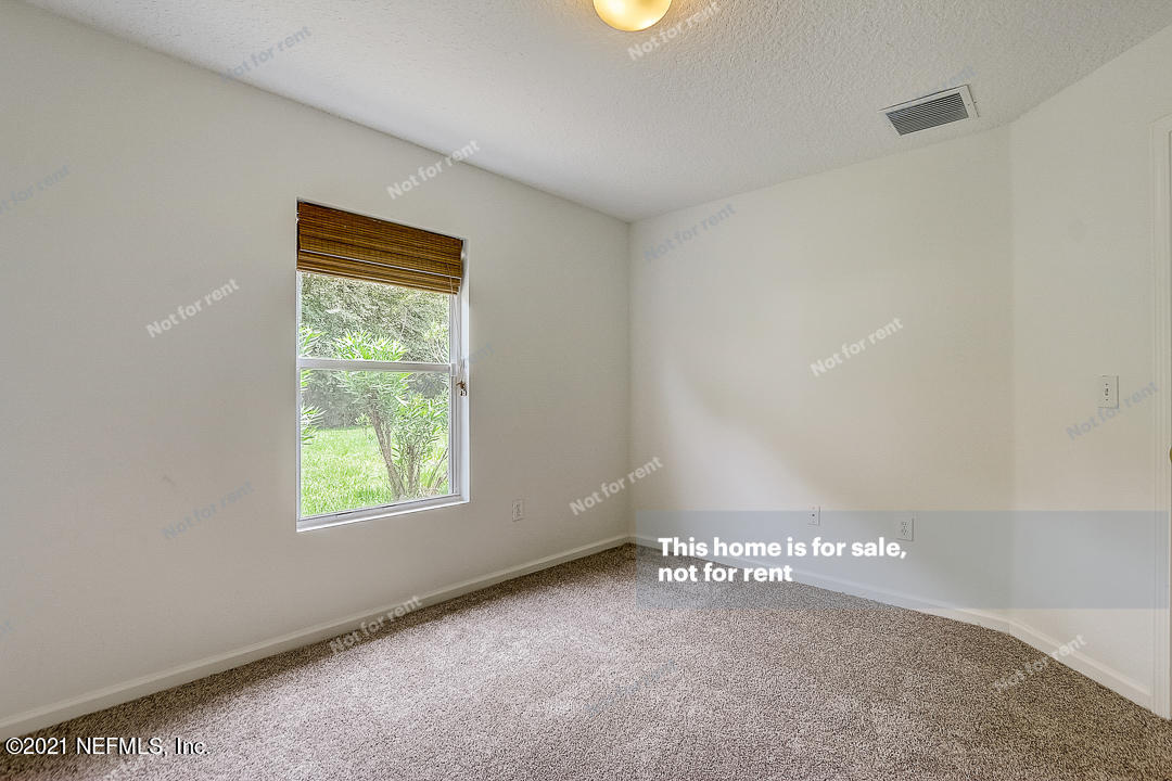 608 Birchbark Trail St. Augustine, FL 32092 - Photo 33 of 35 a view of an empty room and a window