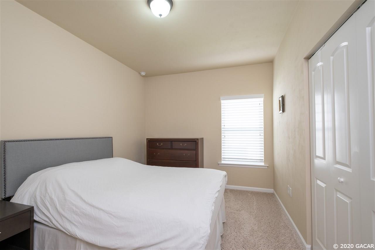 9876 Northwest 17th Road Gainesville, FL 32606 - Photo 16 of 24 Guest Bedroom