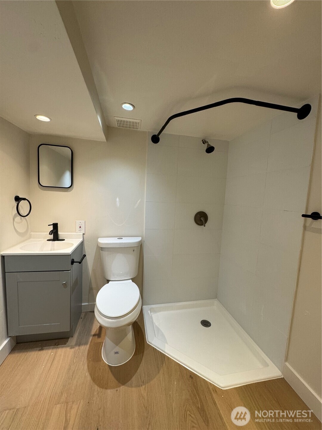 811 Northeast 66th Street Seattle, WA 98115 - Photo 21 of 36 a bathroom with a toilet sink and shower