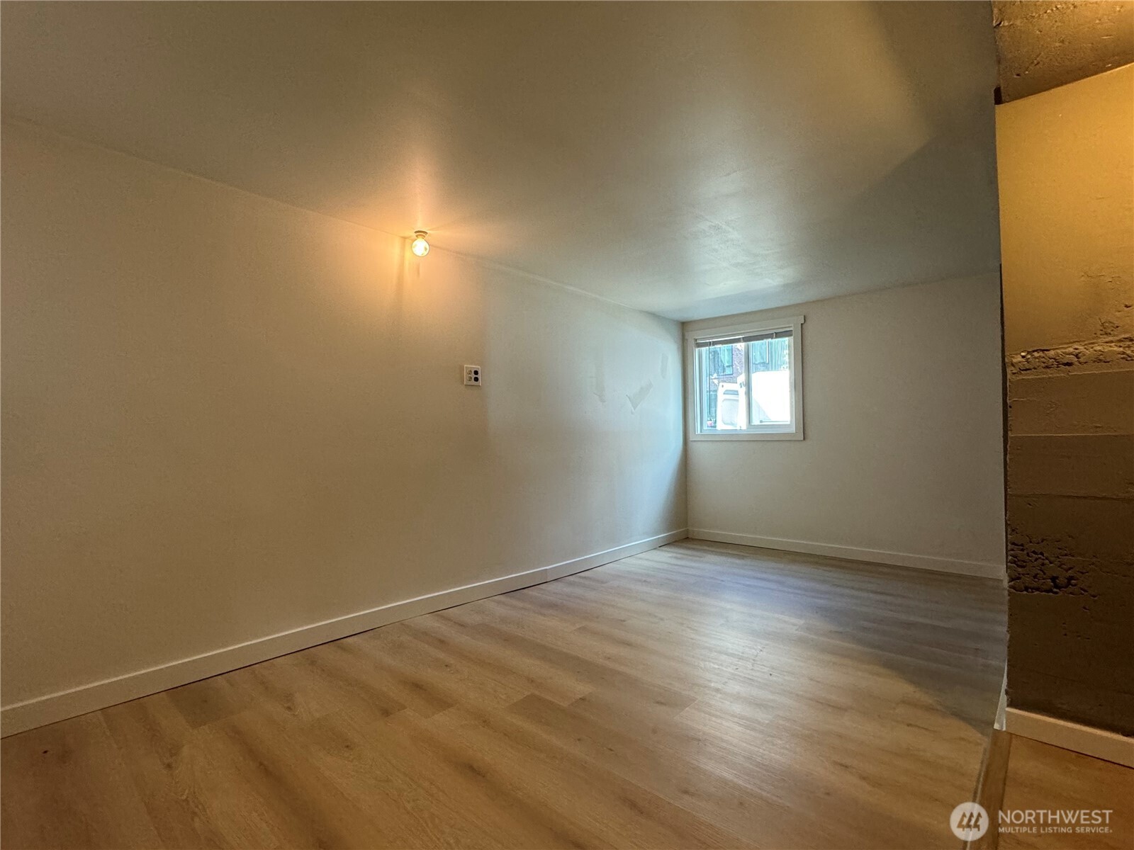 811 Northeast 66th Street Seattle, WA 98115 - Photo 24 of 36 a view of an empty room and window
