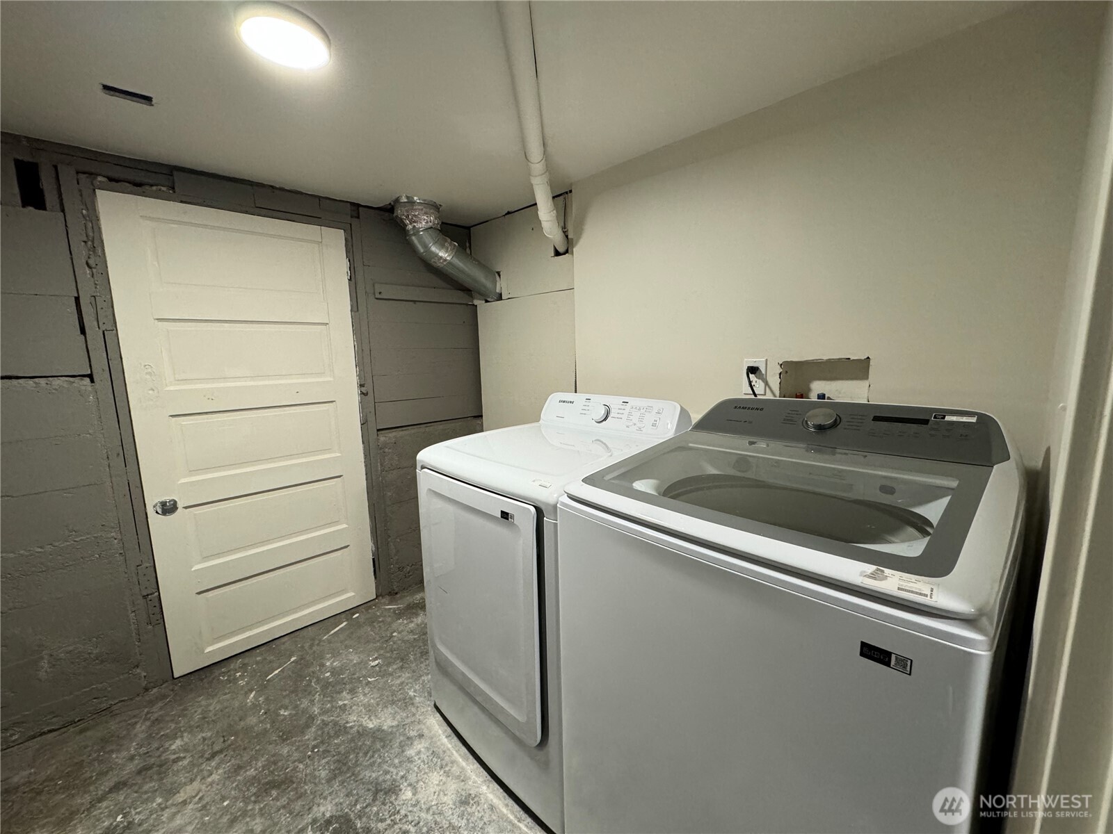 811 Northeast 66th Street Seattle, WA 98115 - Photo 25 of 36 a utility room with dryer and washer