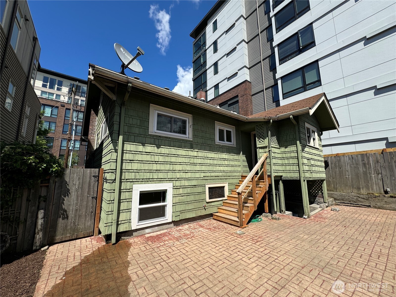 811 Northeast 66th Street Seattle, WA 98115 - Photo 26 of 36 a view of a house with a large window