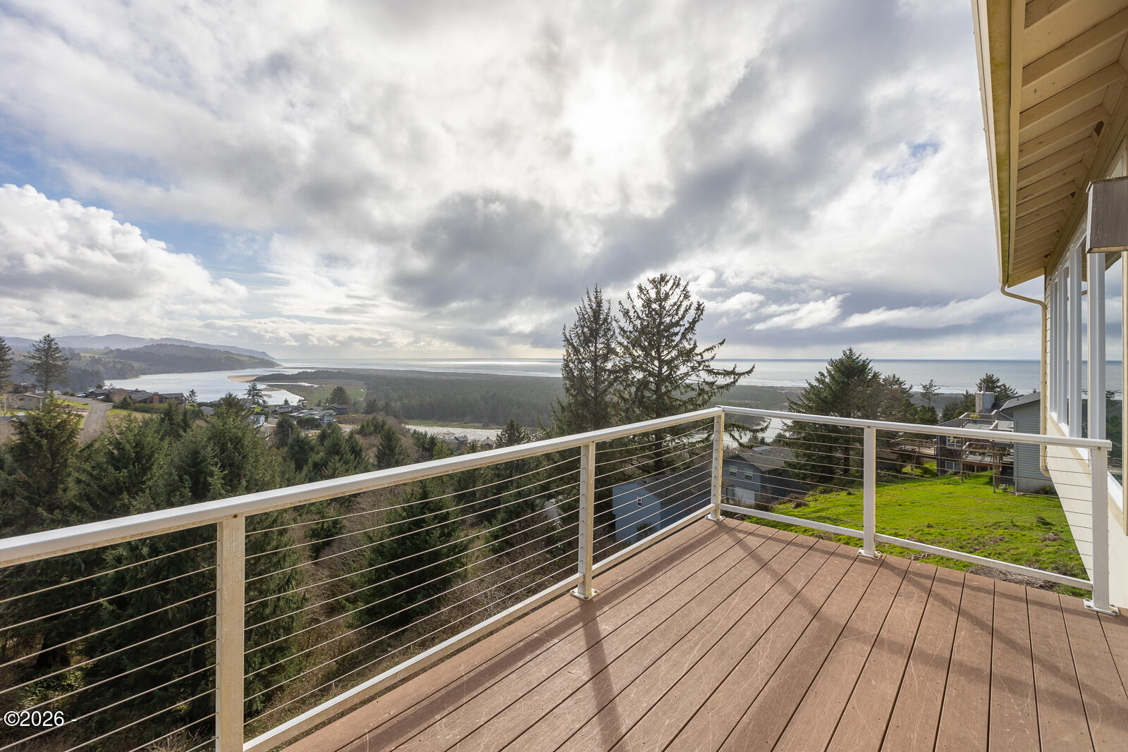 7415 East Summit Road Pacific City, OR 97135 - Photo 34 of 44 a view of balcony with wooden floor and fence