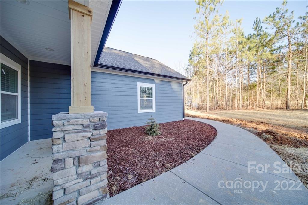 578 Crescent Road Salisbury, NC 28146 - Photo 3 of 41 a front view of a house with trees