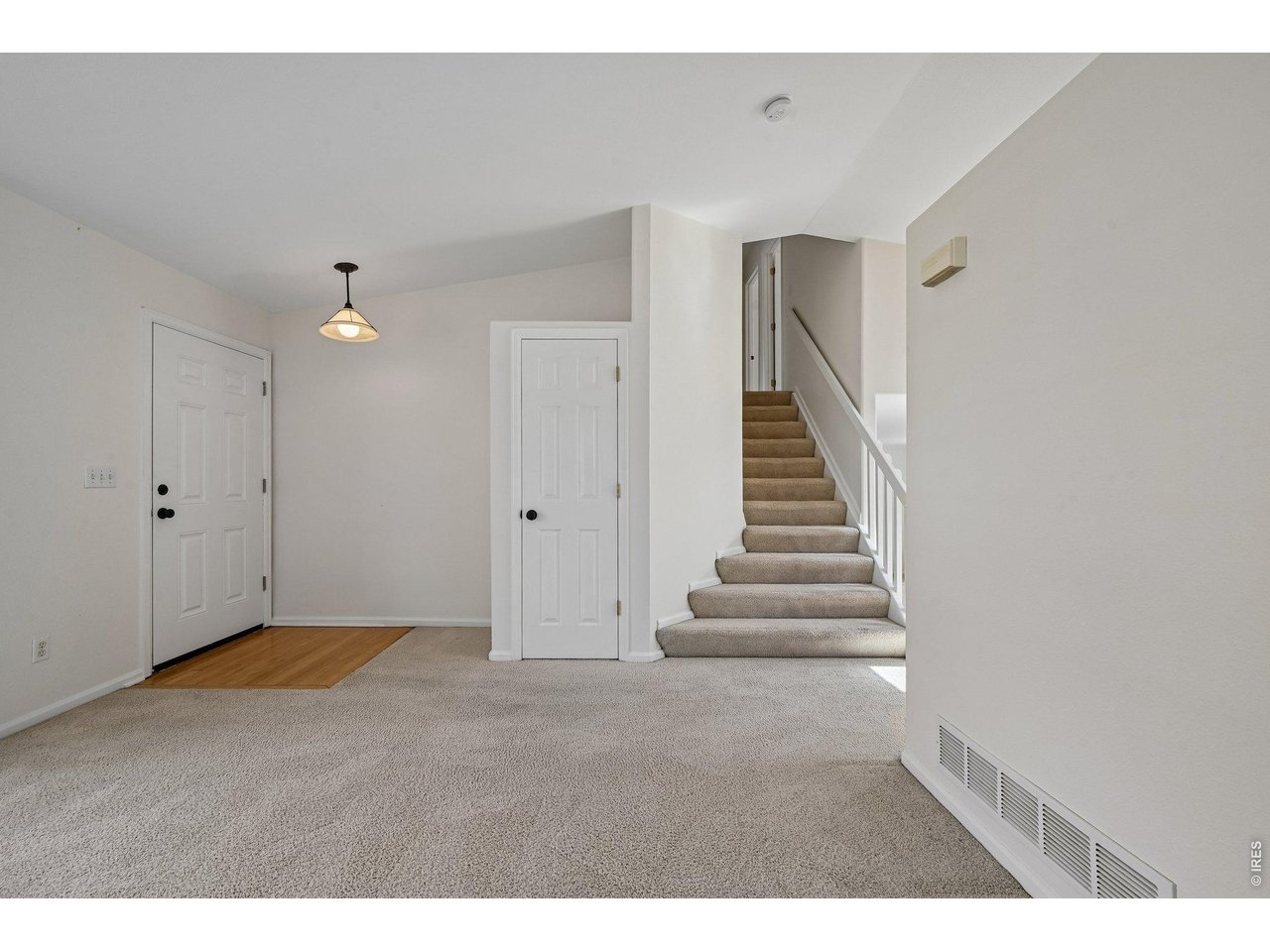 1432 Hyacinth Way Superior, CO 80027 - Photo 12 of 34 a view of an entryway with stairs