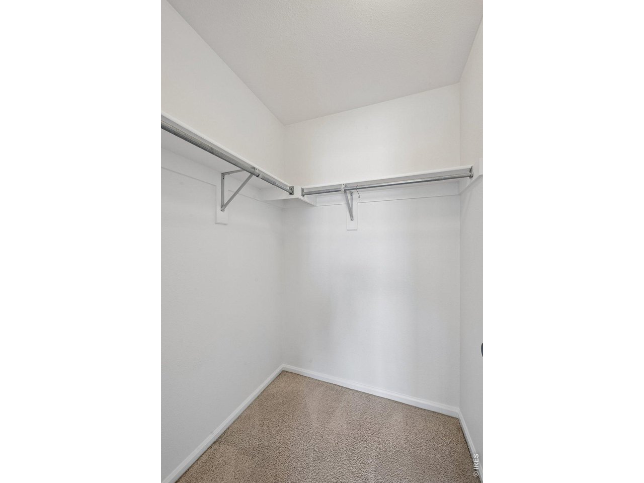 1432 Hyacinth Way Superior, CO 80027 - Photo 16 of 34 a view of a room with racks on the wall