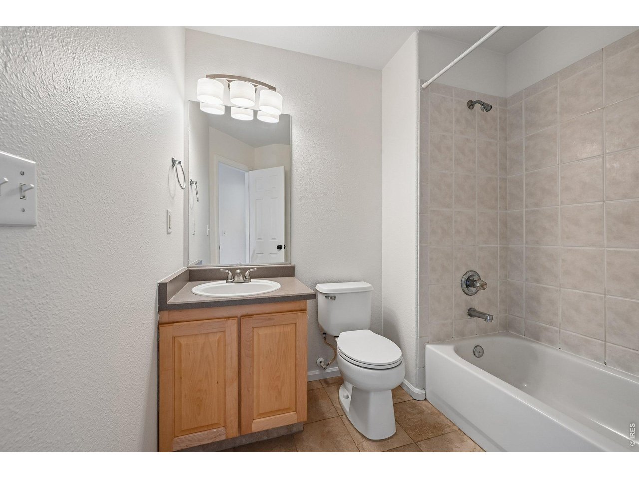 1432 Hyacinth Way Superior, CO 80027 - Photo 24 of 34 a bathroom with a granite countertop sink a toilet and shower