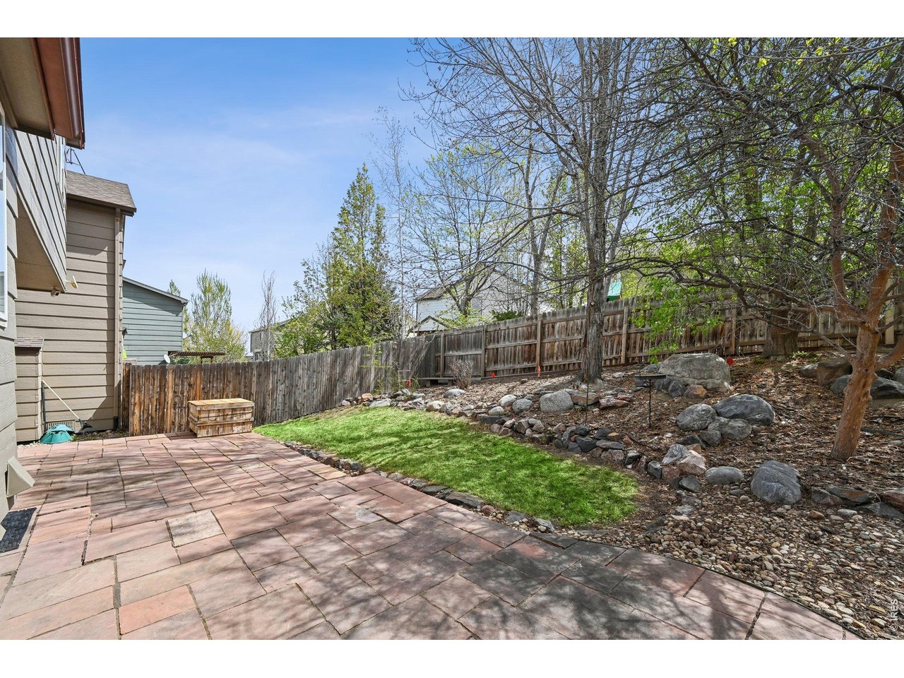 1432 Hyacinth Way Superior, CO 80027 - Photo 29 of 34 a backyard of a house with lots of green space
