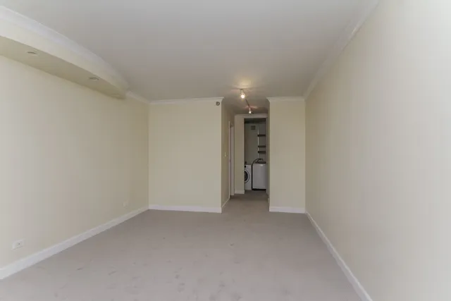 a view of a closet and utility room