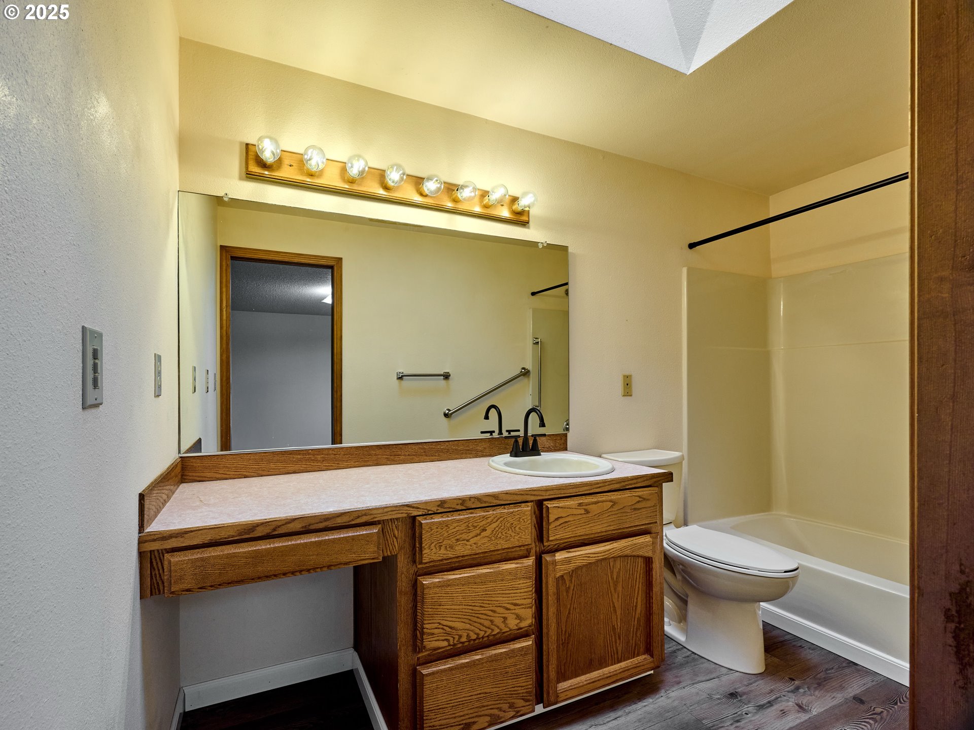 2135 Country Club Terrace Woodburn, OR 97071 - Photo 14 of 36 a bathroom with a sink a toilet and mirror
