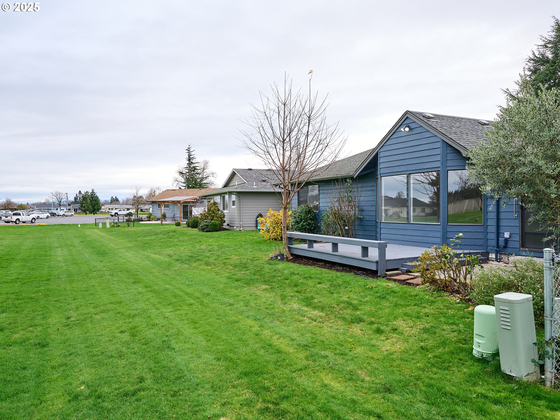 2135 Country Club Terrace Woodburn, OR 97071 - Photo 28 of 36 a front view of house with garden