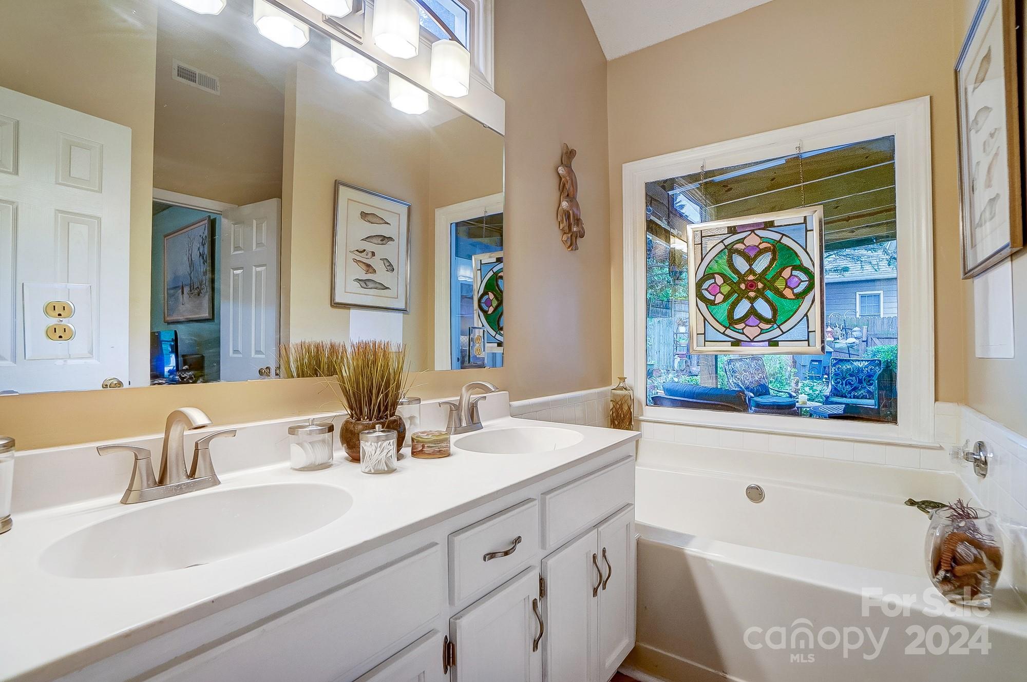3063 River Ridge Drive Gastonia, NC 28056 - Photo 20 of 42 a bathroom with a sink and a mirror