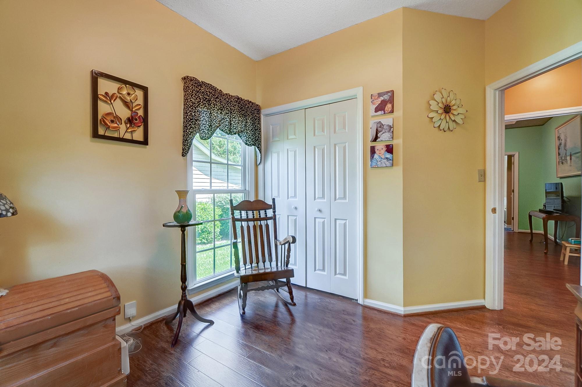 3063 River Ridge Drive Gastonia, NC 28056 - Photo 26 of 42 a view of a livingroom with furniture and hardwood floor