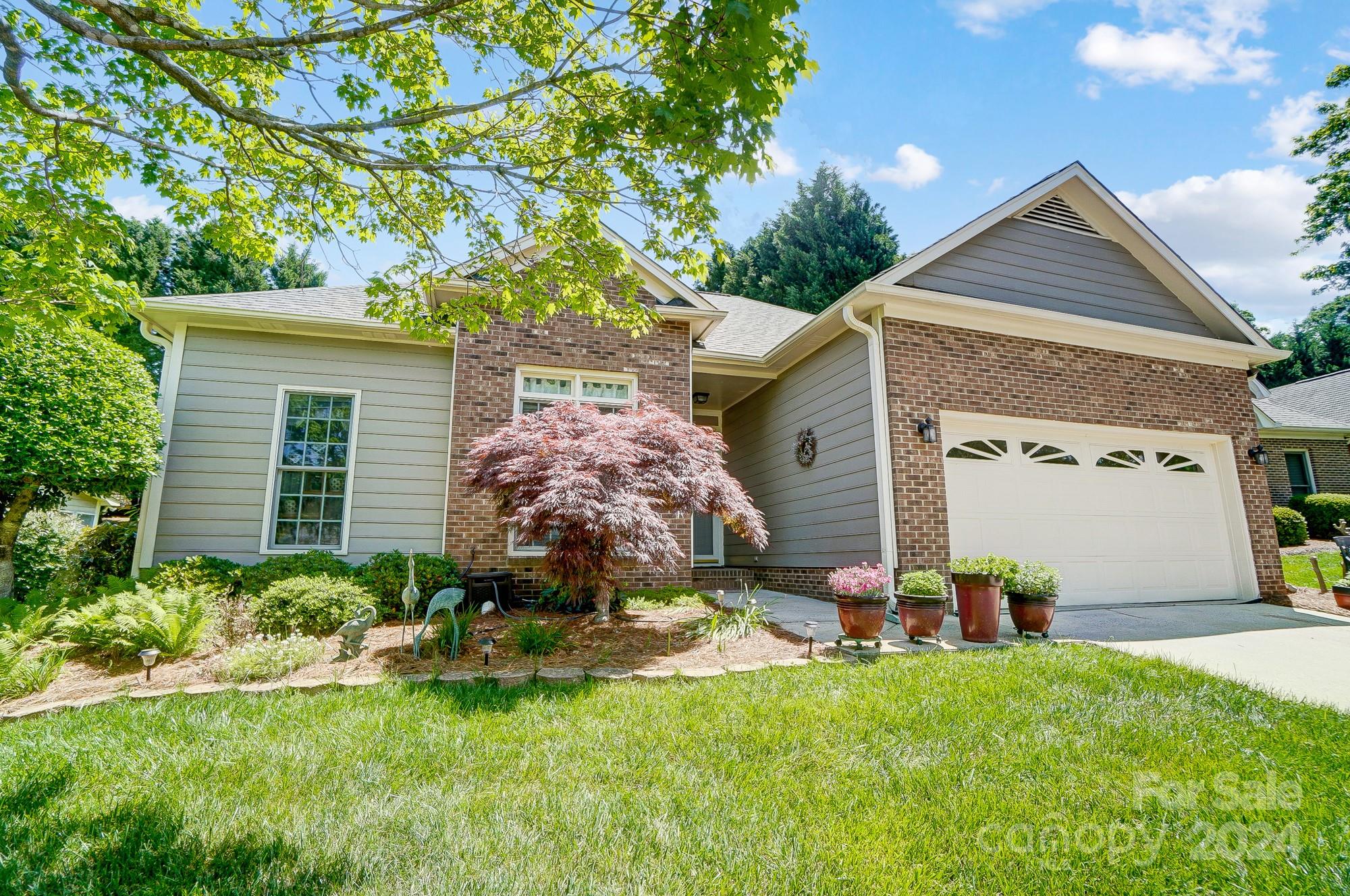 3063 River Ridge Drive Gastonia, NC 28056 - Photo 3 of 42 a front view of a house with a yard