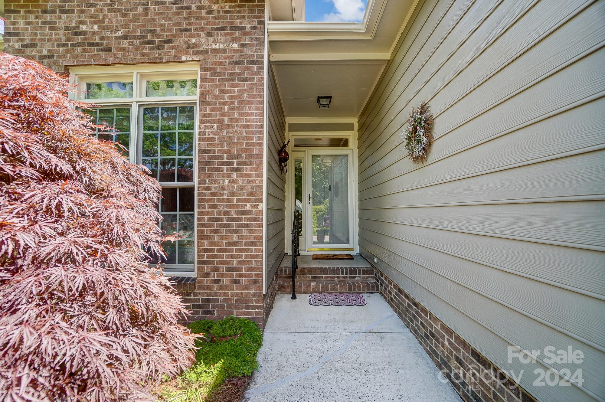 3063 River Ridge Drive Gastonia, NC 28056 - Photo 5 of 42 a side view of a house with a door