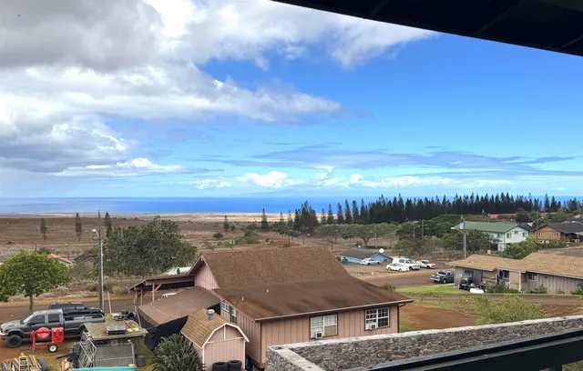 a view of a lake with houses